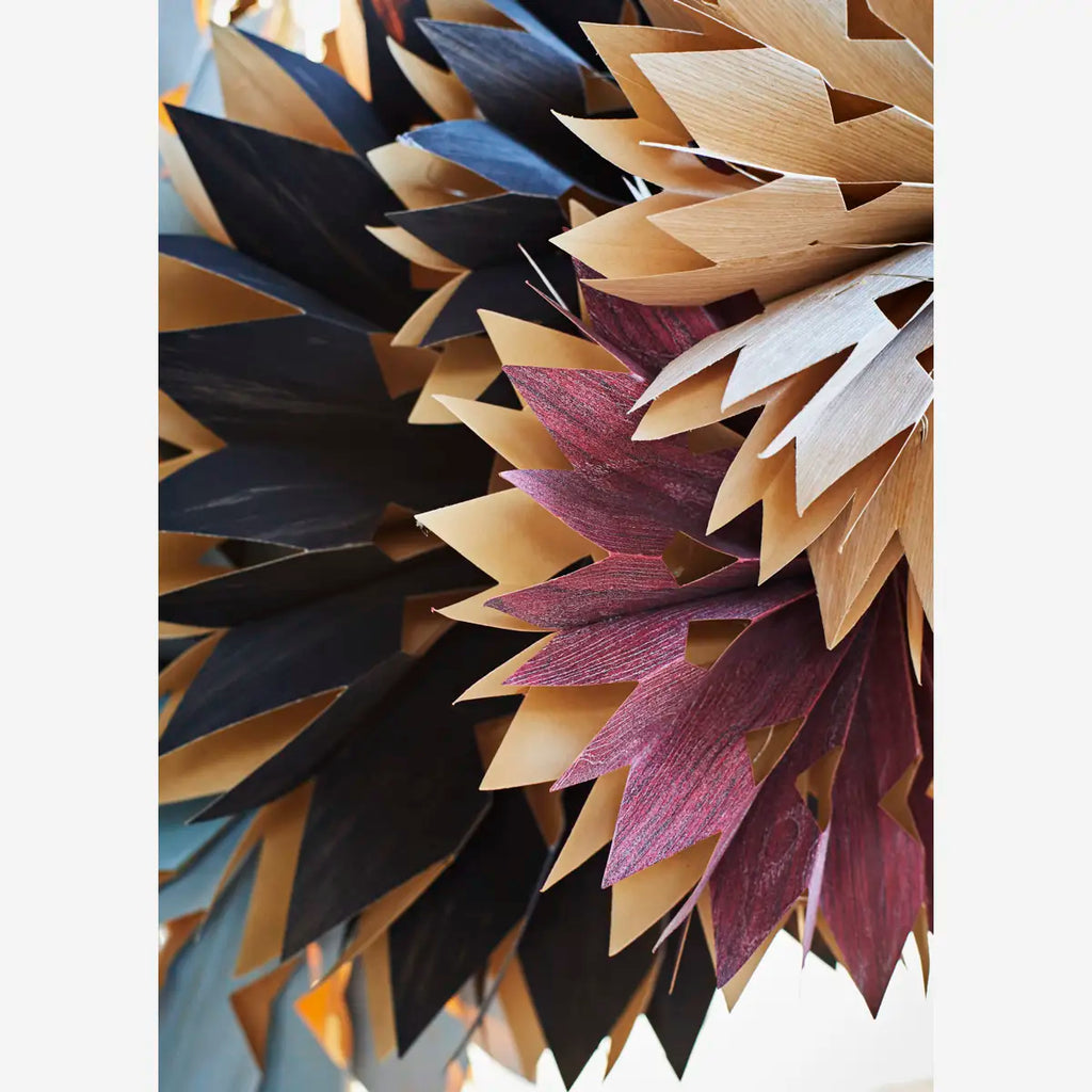 Furnierpapierstern mit Lichtern